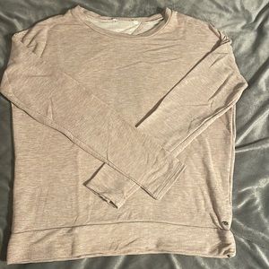 Tan sweatshirt with small open back